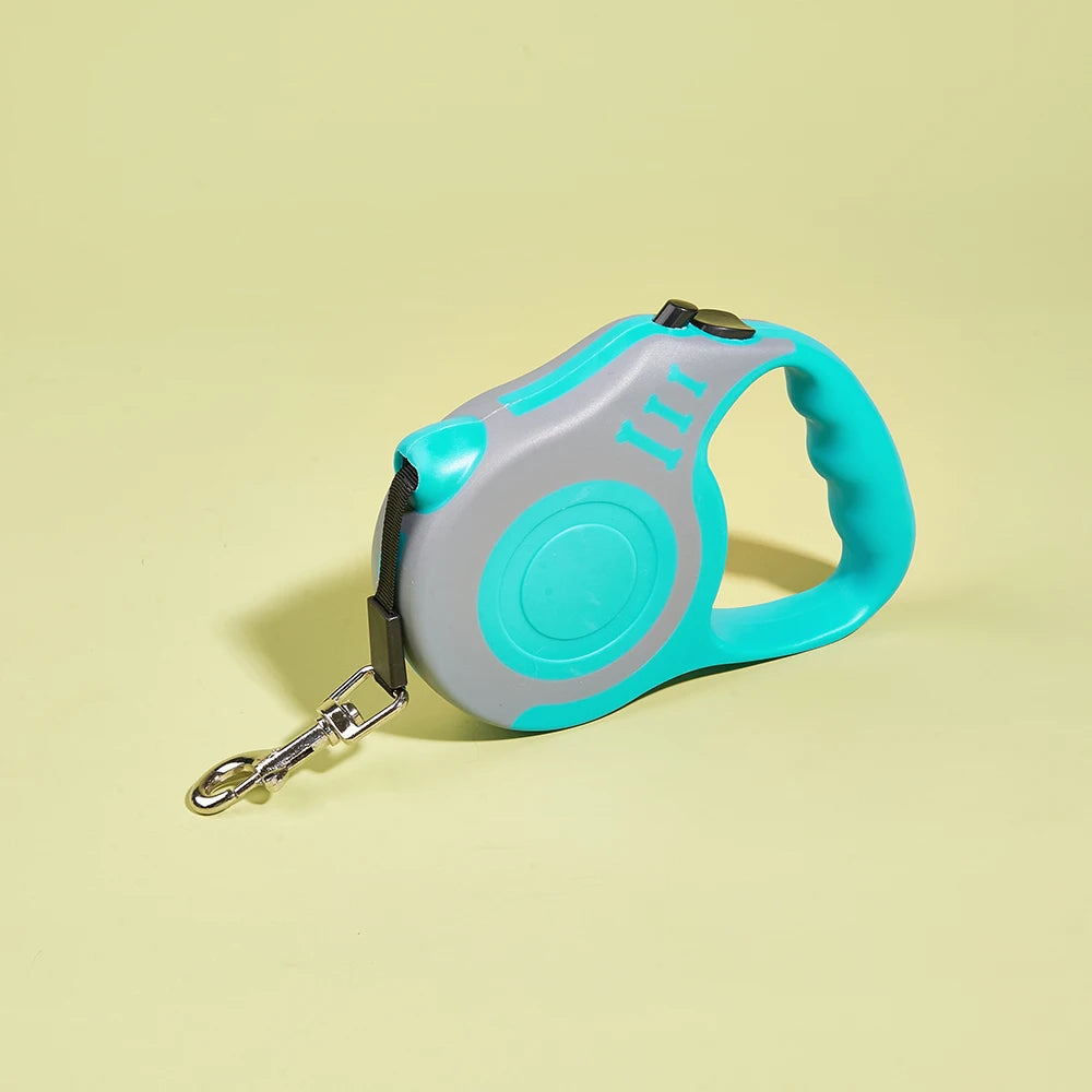 Light gray and turquoise retractable pet leash reel on side view with carabiner