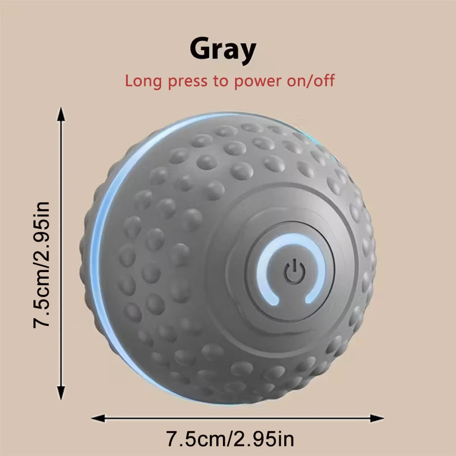 Gray smart interactive dog ball with textured bumps and glowing power button